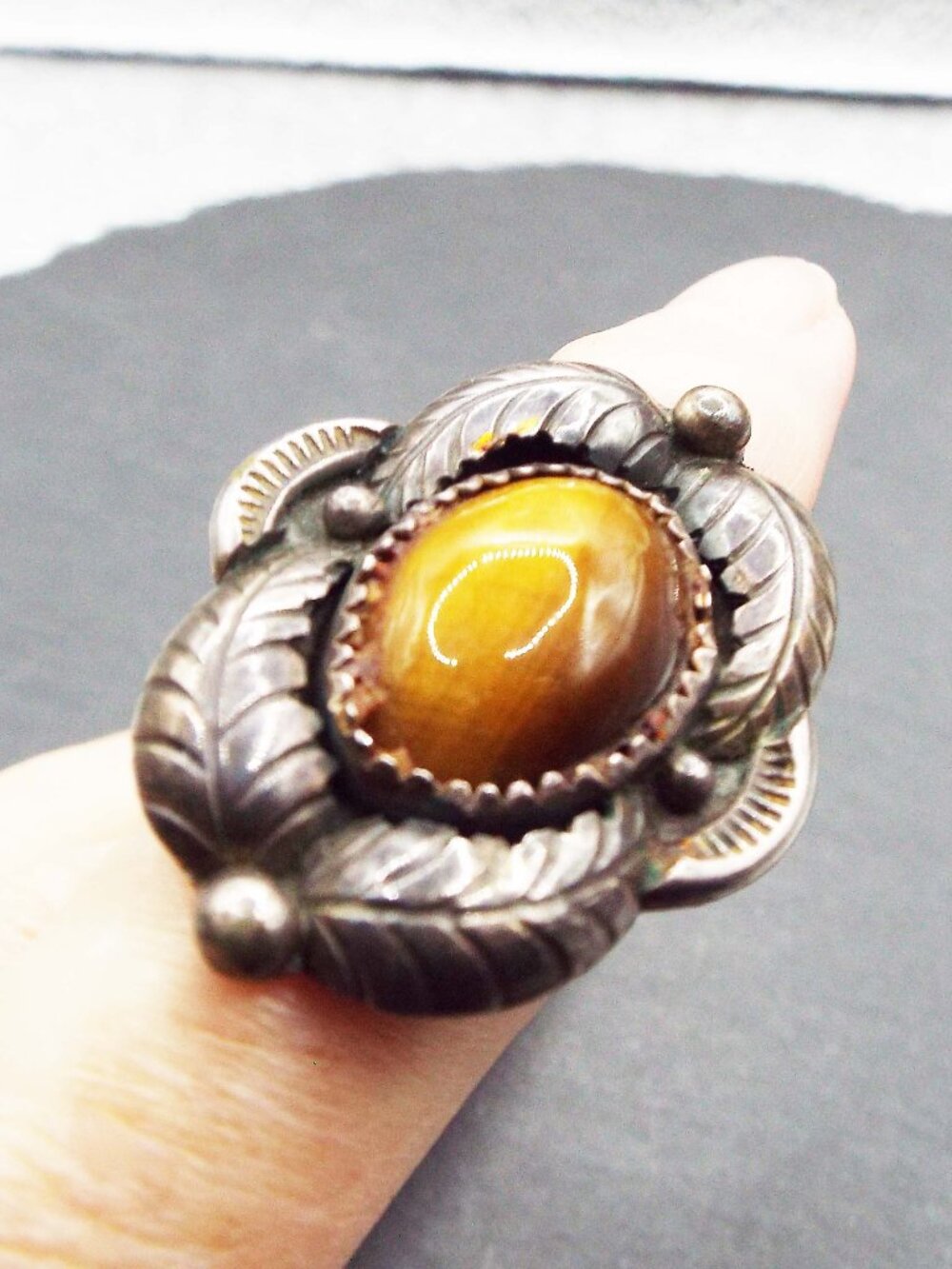 ANT. NAVAJO PAWN TIGER'S EYE OVAL CAB W/ LEAVES AROUND DESIGN SZ. 6 RING 15A